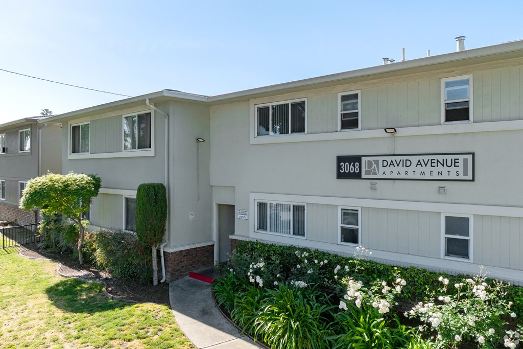 Apartment building with the number 3068 on the front.