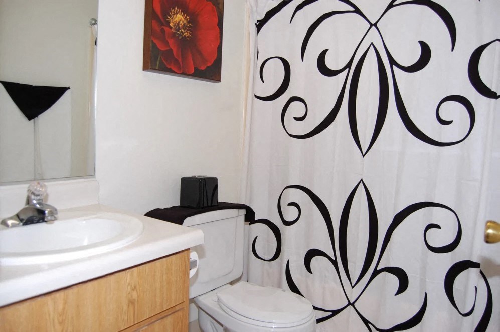 a bathroom with a toilet and sink