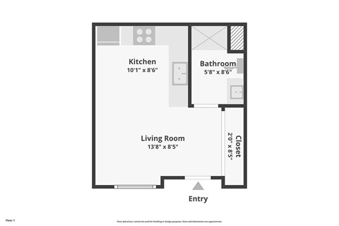 A floor plan of a small apartment with a kitchen, bathroom, living room and entry.