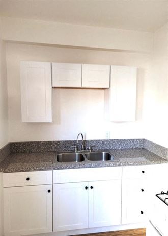 Kitchen with white cabinets