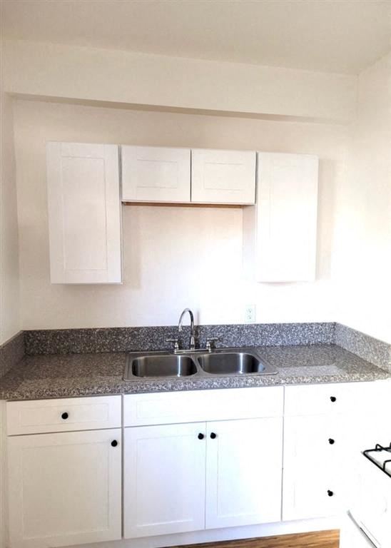 Kitchen with white cabinets