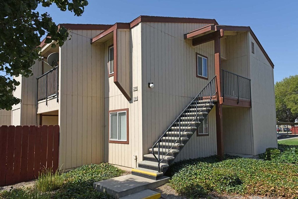 an image of an apartment building with stairs