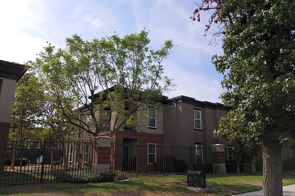 a building with a fence in front of it