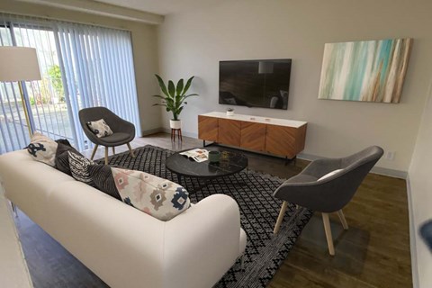 A living room with a white couch, a black and white rug, a wooden cabinet, a TV, and a painting on the wall.