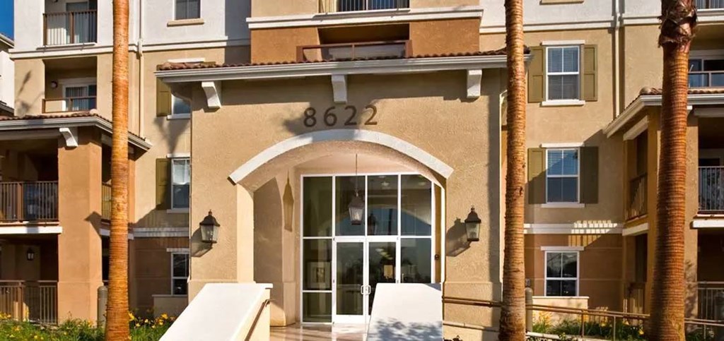 The front of apartment building number 8622 is shown.