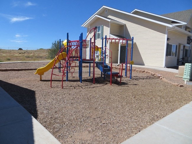 a playground in front of a building