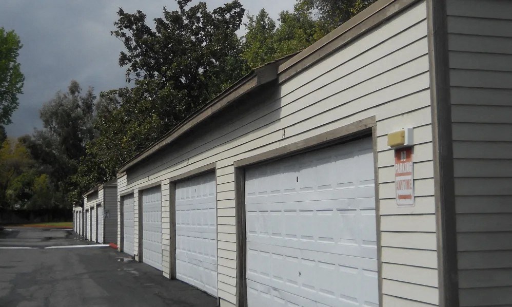 a row of garage doors on the side of a building
