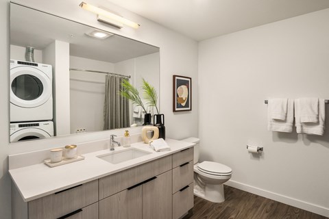 our apartments offer a bathroom with a washer and dryer