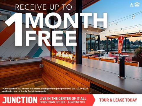a poster for a month free meal at a bar with a fireplace