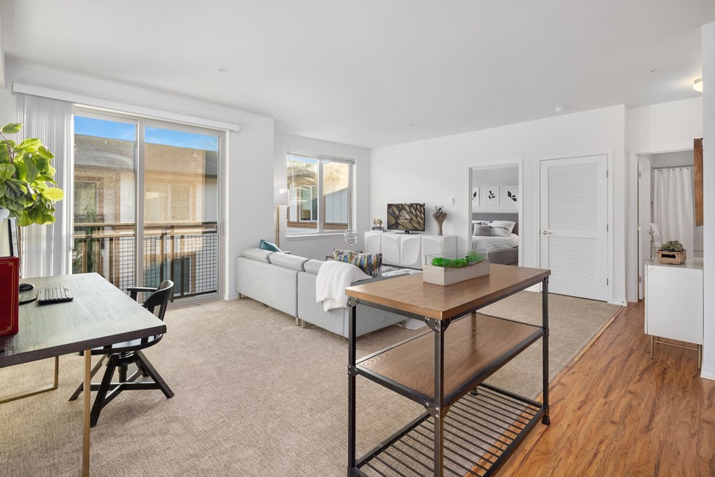 a living room with a couch and a table