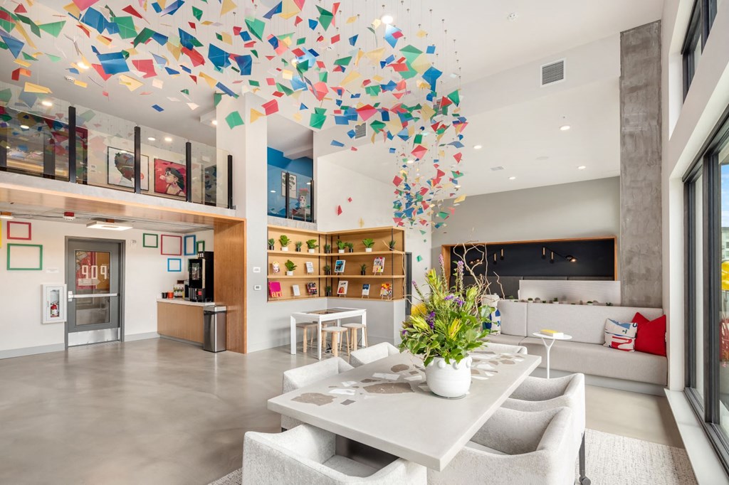 a dining room with a table and chairs