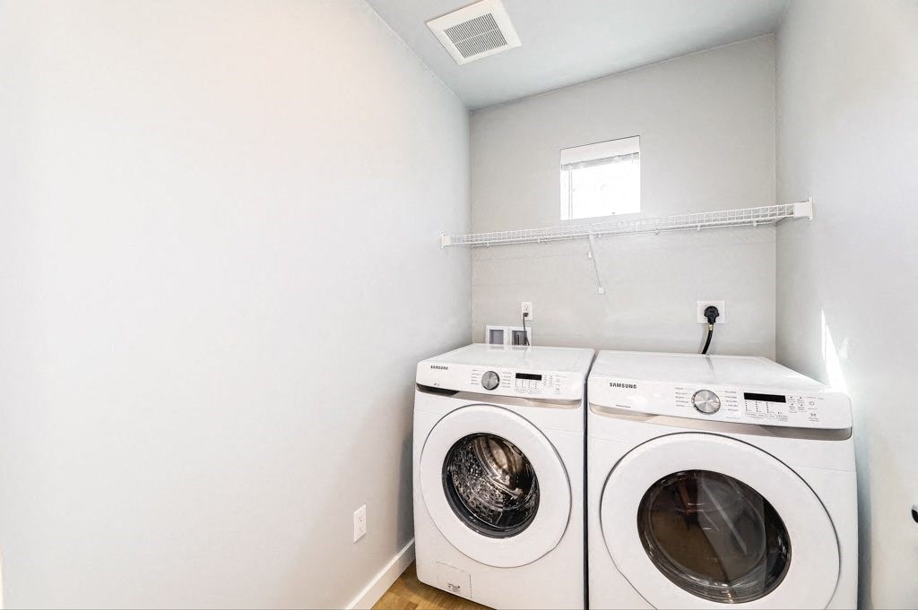 a washer and dryer in a laundry room
