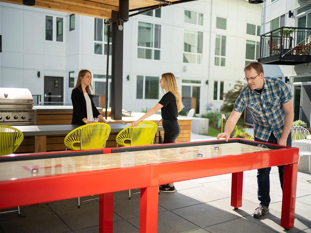 people playing a game of ping pong on a table