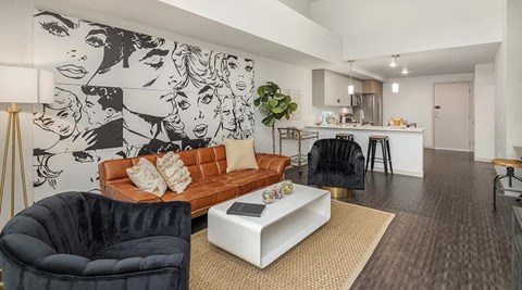 a living room with a couch and a table