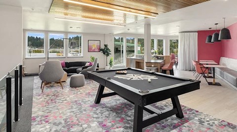 a large living room with a pool table