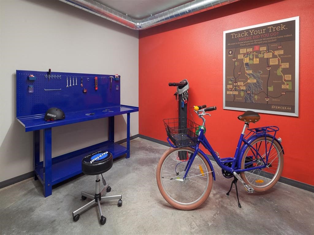 a bike and a desk in a room