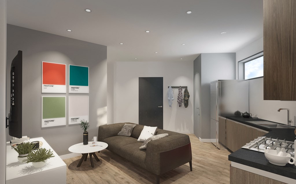 a living room and kitchen in an apartment