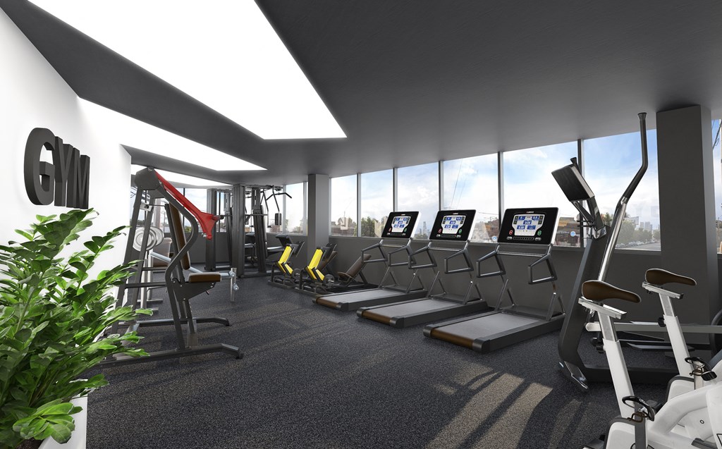 a rendering of a gym with cardio machines and windows