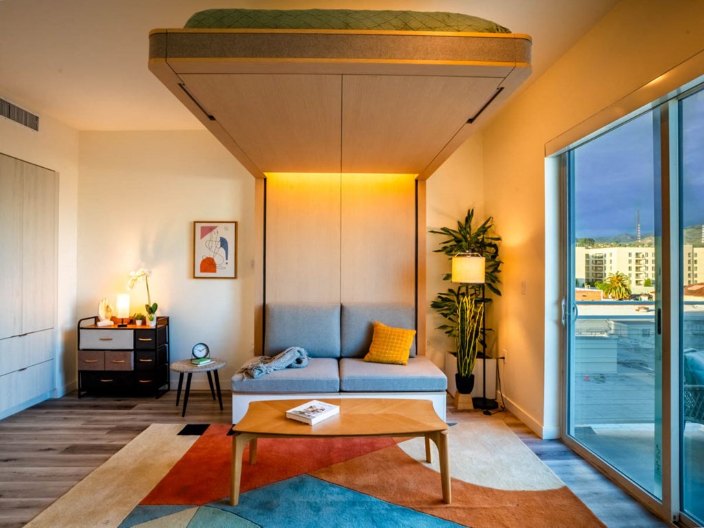 a living room with a couch and a table