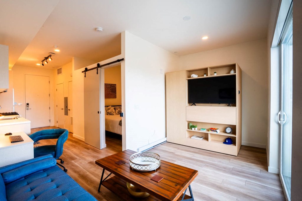 a living room with a couch and a table