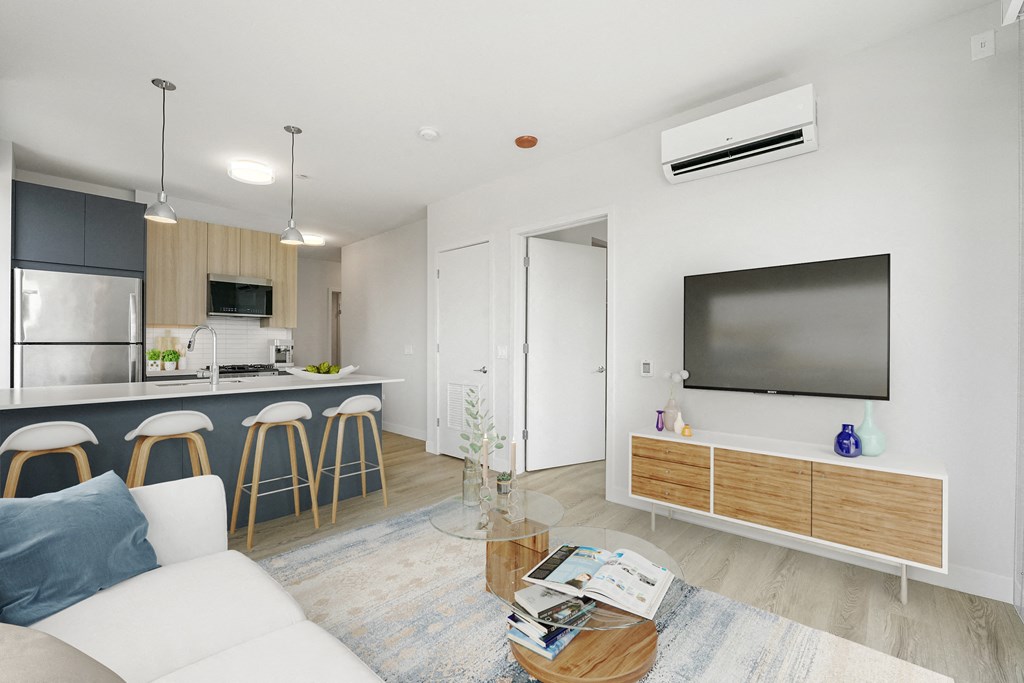 a living room with a couch and a tv at Inspire West Town, CHICAGO, IL, 60642