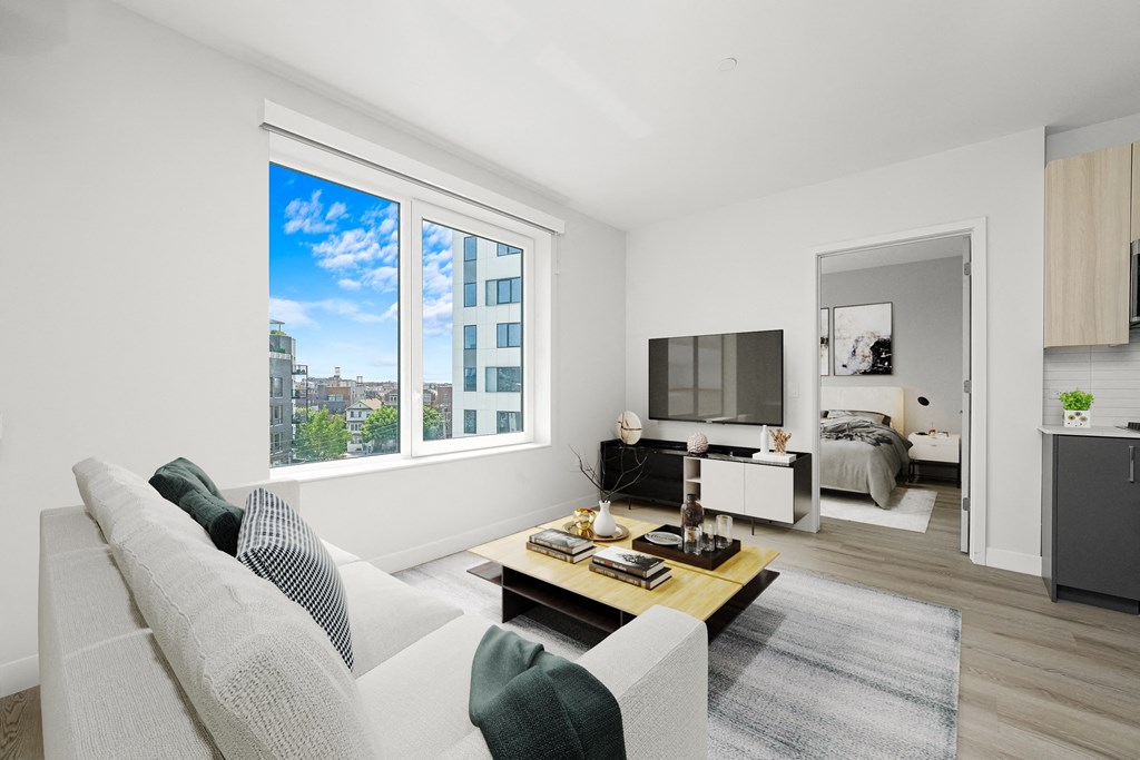 a living room with a couch and a coffee table at Inspire West Town, Illinois