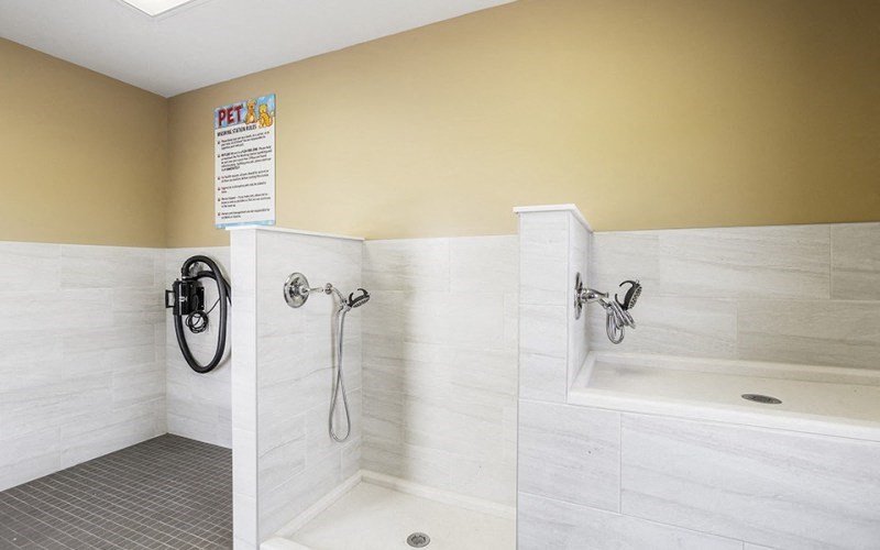 a bathroom with a shower and a tub