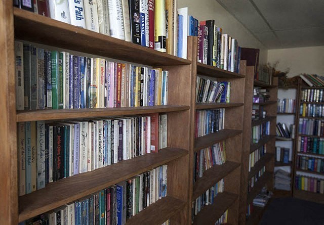 a book shelf filled with lots of books