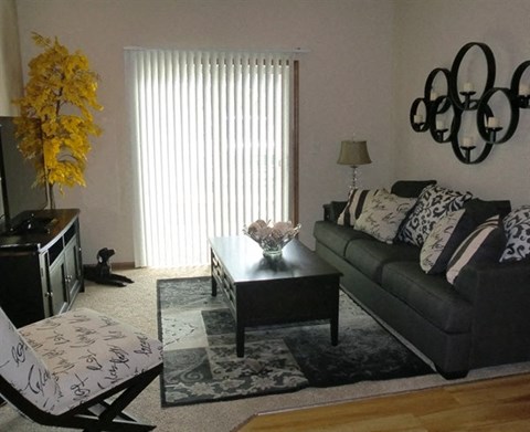 a living room with a couch and a coffee table