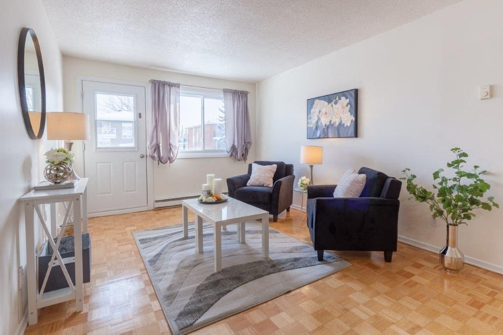 a living room with a couch and a table