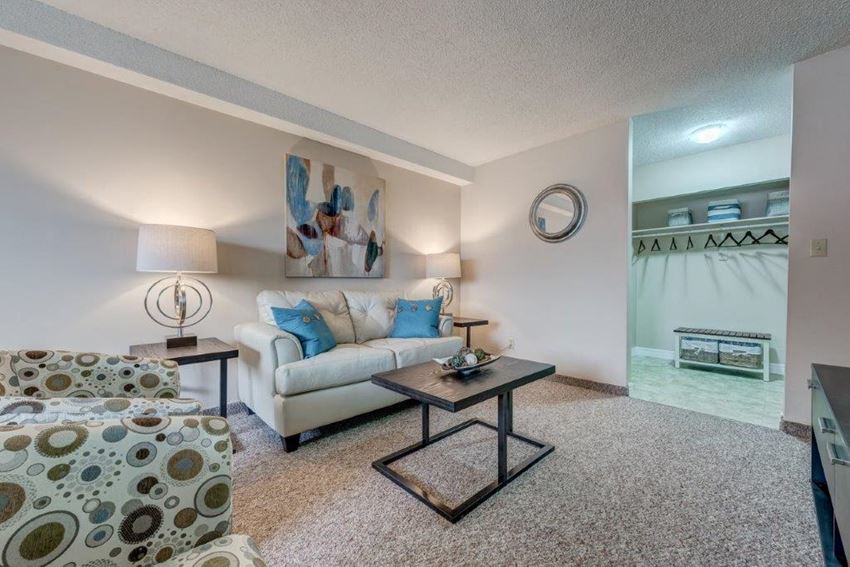 a living room with a couch and a table