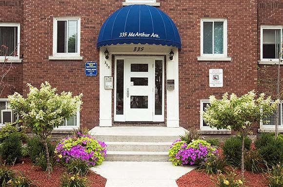 a red brick building with a blue dome on top of it
