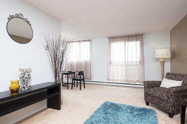 a living room with a couch and a table