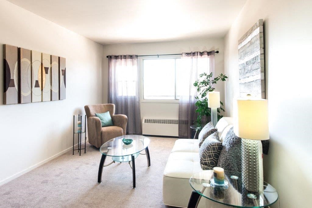 a living room with a couch and a table