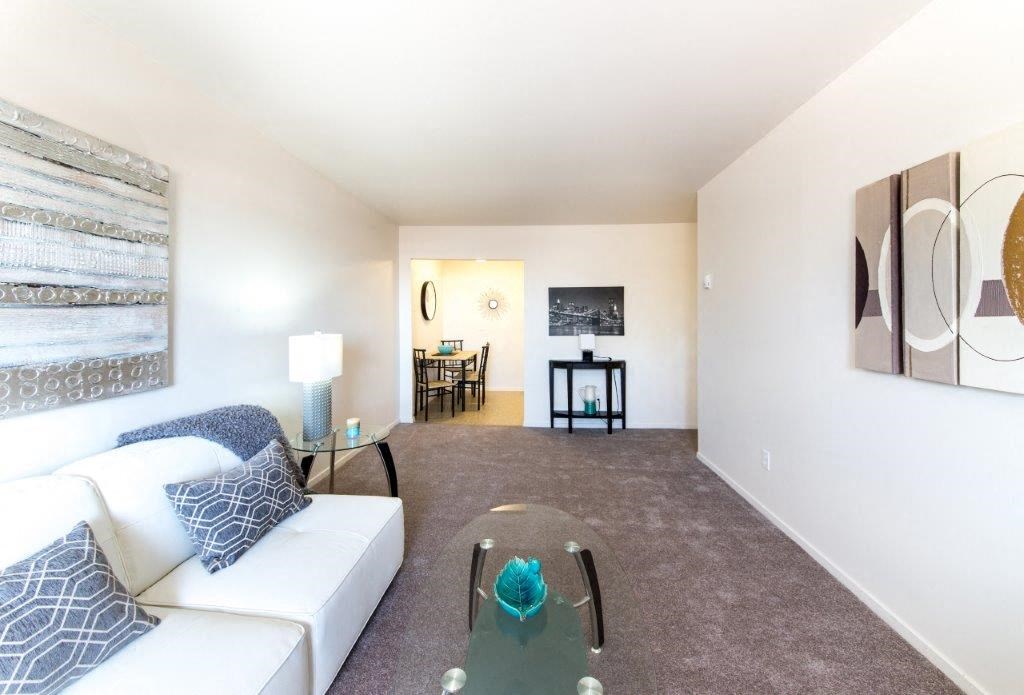 a living room with a couch and a table