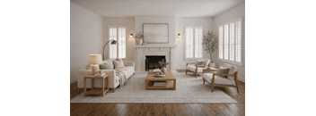 A living room with a fireplace, two couches, a coffee table, and a floor lamp.