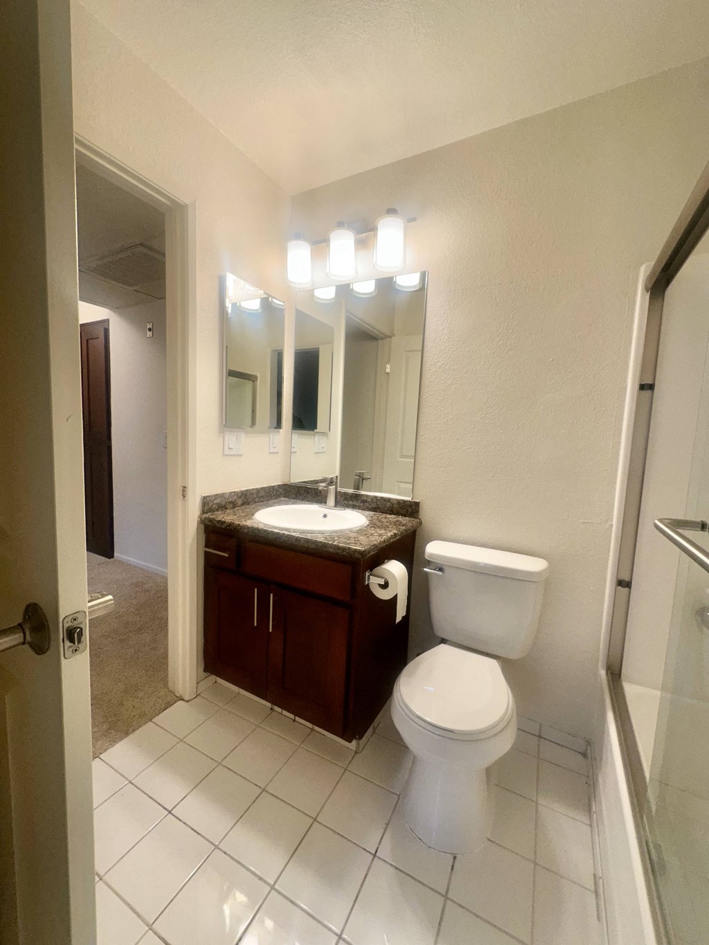 a bathroom with a toilet and a sink