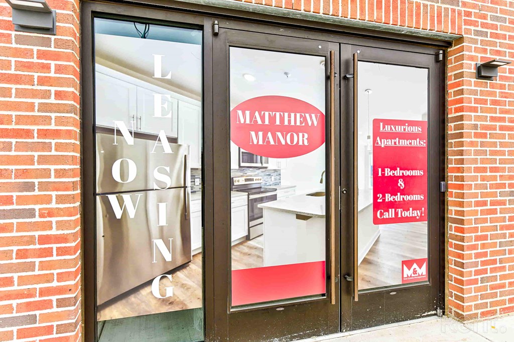 The doorway to a Matthew Manor apartment complex.