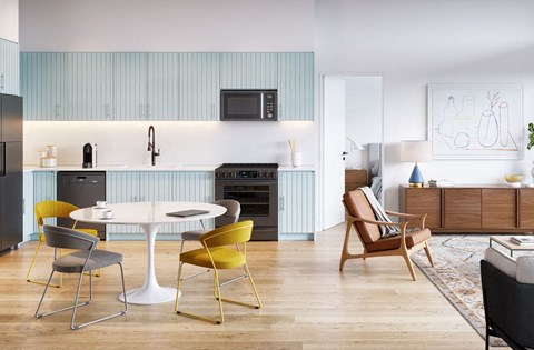 A modern kitchen with a white table and chairs.