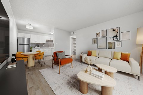 A modern living room with a white sofa, orange armchair, and a wooden coffee table.