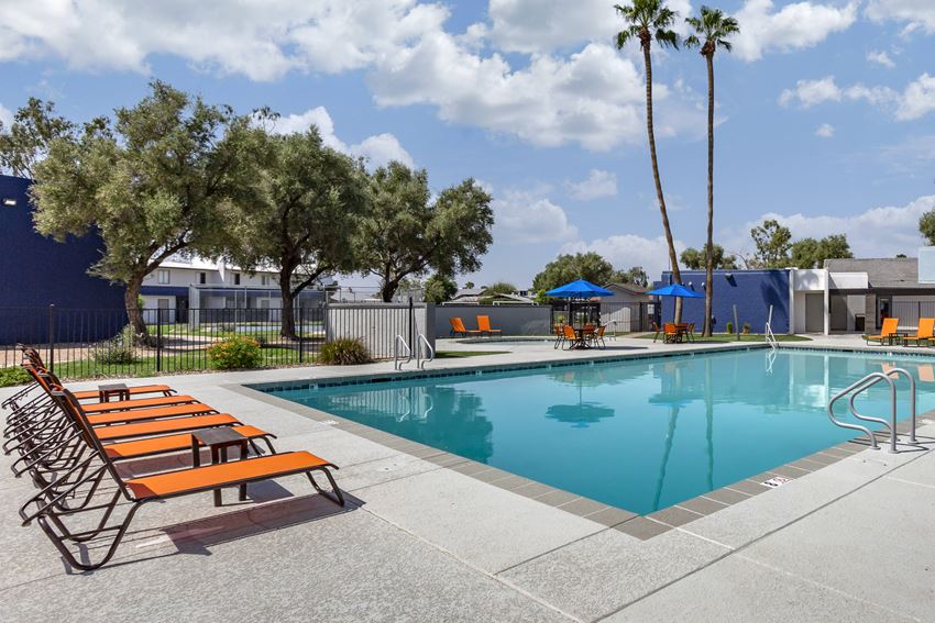 our apartments have a large pool and lounge chairs