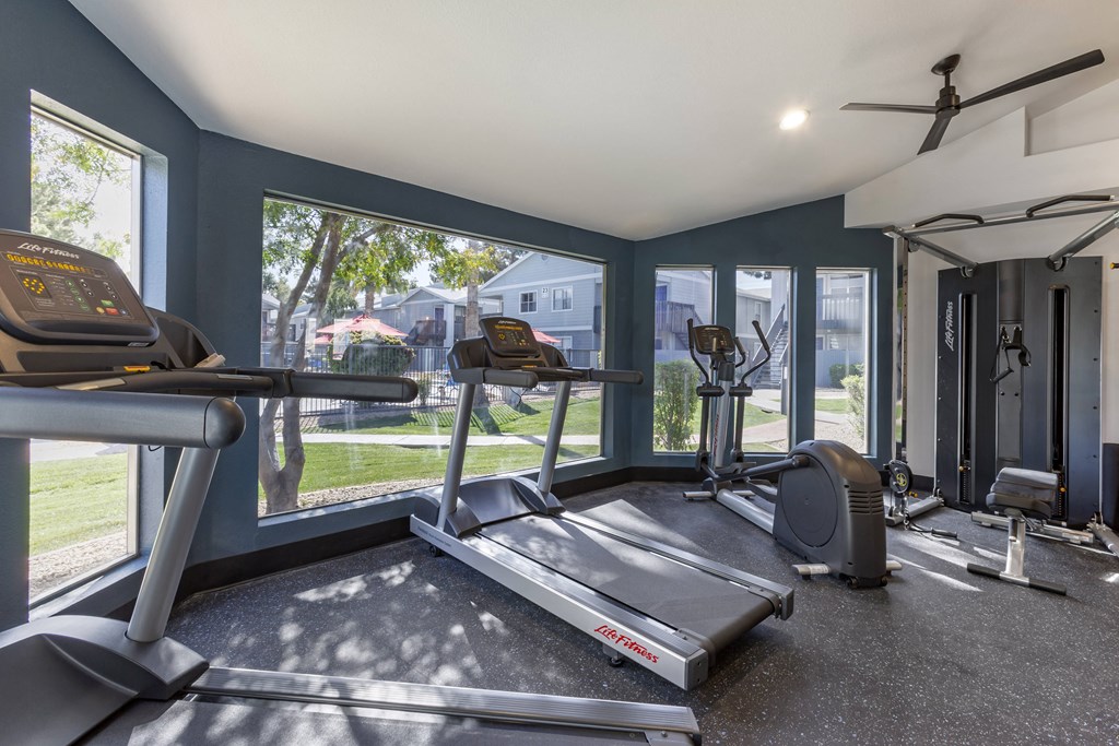 the gym with treadmills and weights at the preserve at greatstone