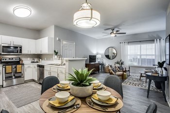 Beautifully appointed interiors with white cabinetry and stainless steel appliances - Photo Gallery 3