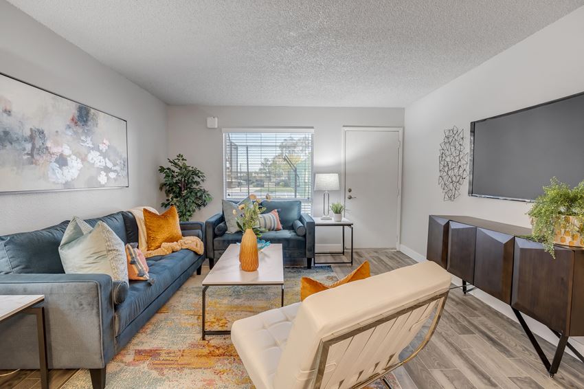 Phoenix Apartments - Spacious Open Concept Living Room With Beautiful Wood Floors