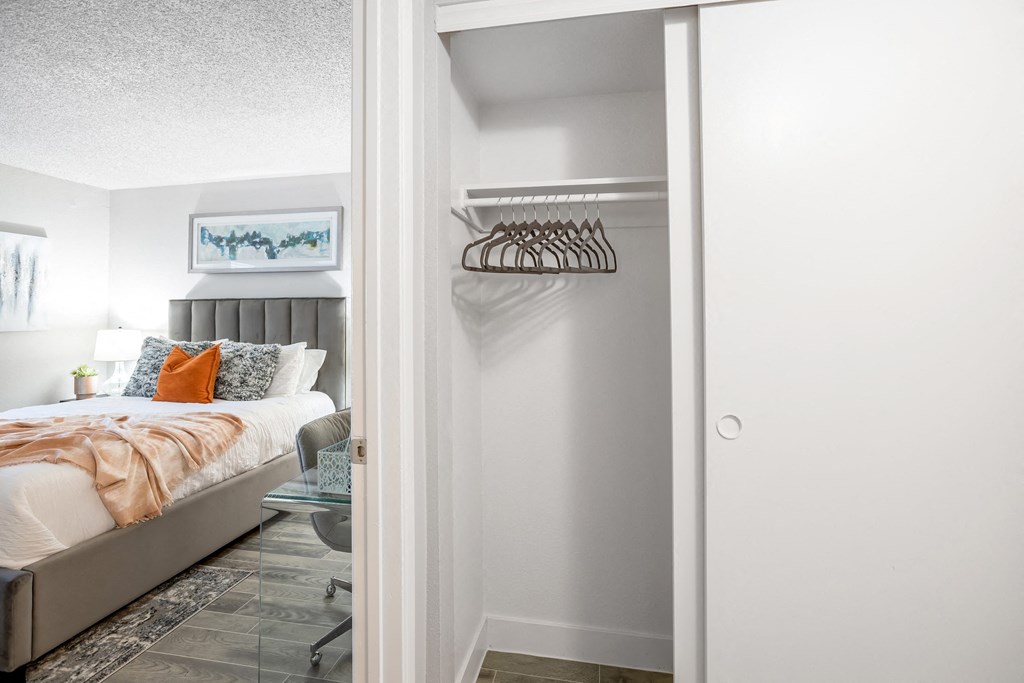 Apartments in Phoenix - Spacious Bedroom With Wood Floors and Ample Closet Space