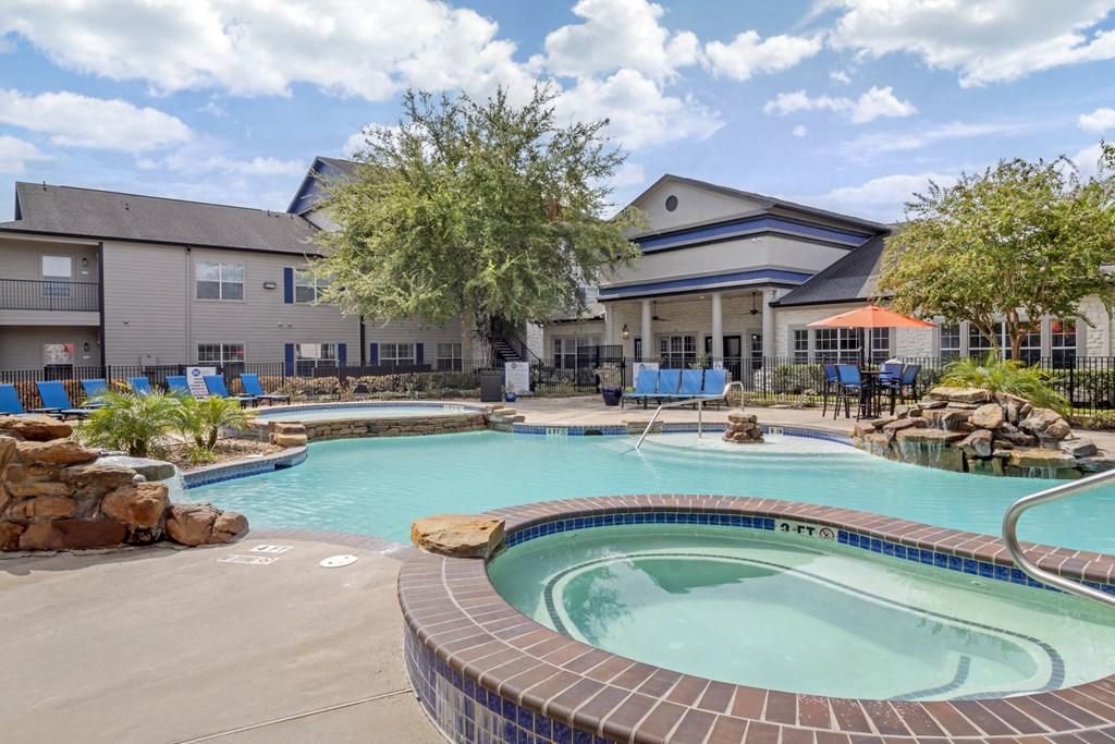 the preserve at ballantyne commons pool and spa with apartment buildings