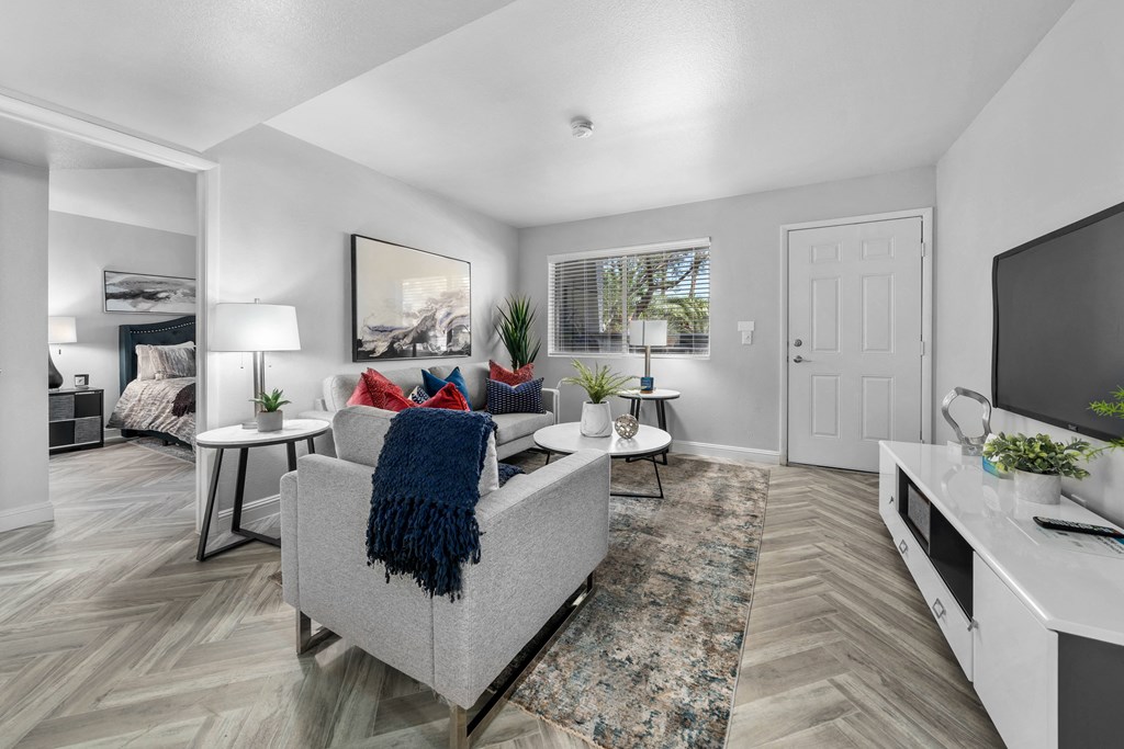 a living room with a couch and a tv