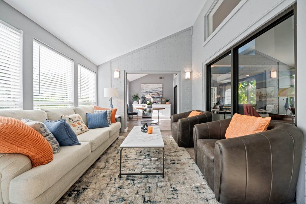 a living room with a couch and a coffee table