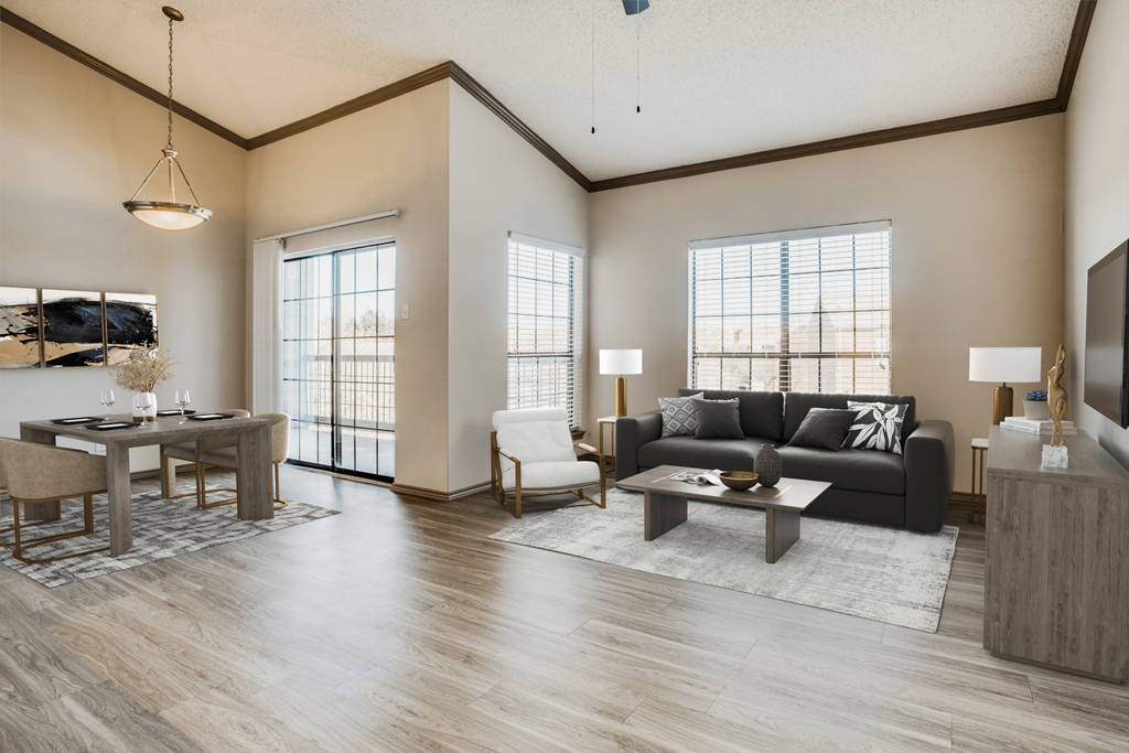 a living room and dining room with a couch and a table
