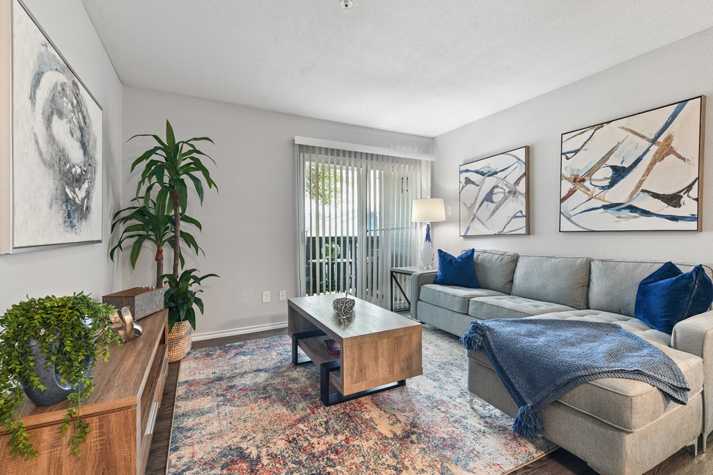 a living room with a couch and a coffee table